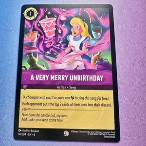 a very merry unbirthday - 60/204 (uncommon) — lorcana: azurite sea